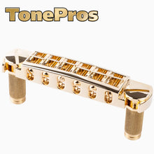 Load image into Gallery viewer, NEW Tonepros AVT2M Wraparound Bridge with METRIC Locking Studs - GOLD