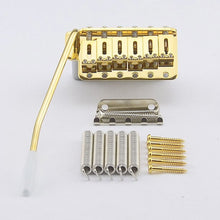 Load image into Gallery viewer, NEW Gotoh GE102T Traditional Tremolo for Strat w/ Steel Saddles - GOLD